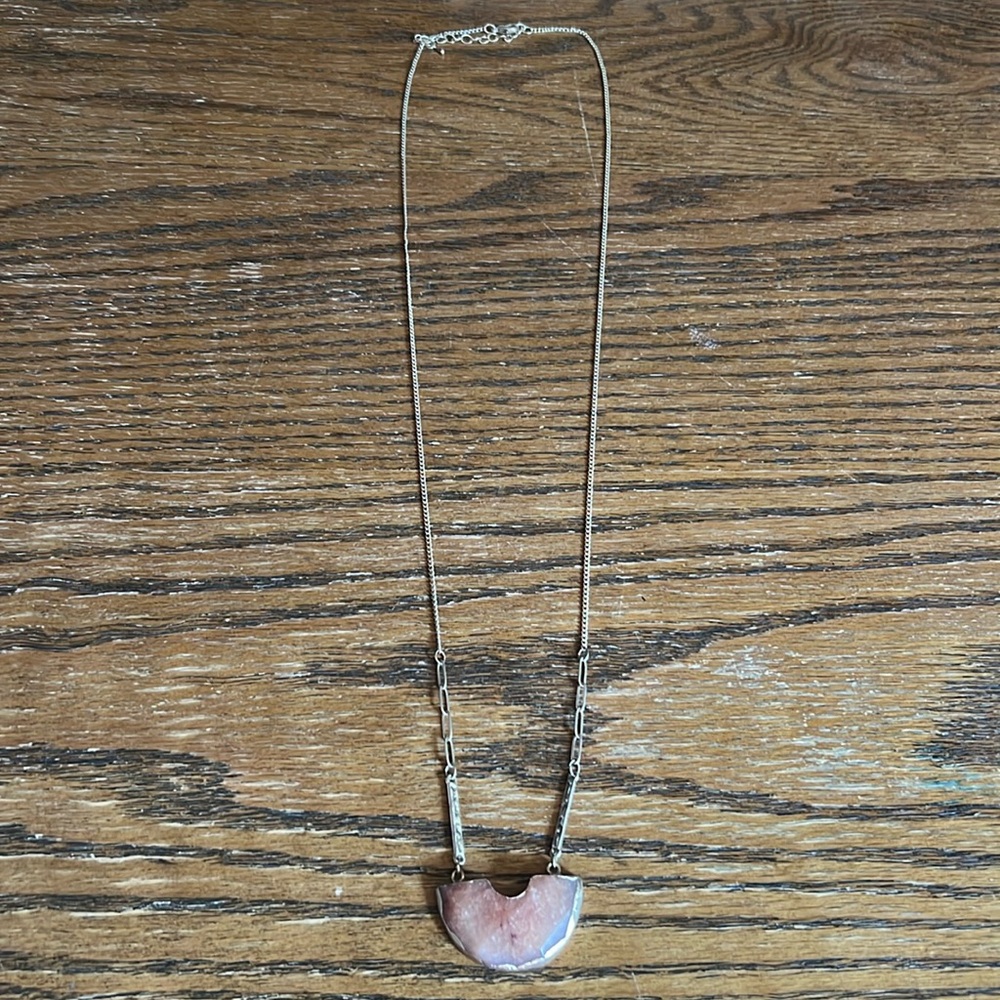 Bohemian earthy stone with gold trim and thin gold necklace
